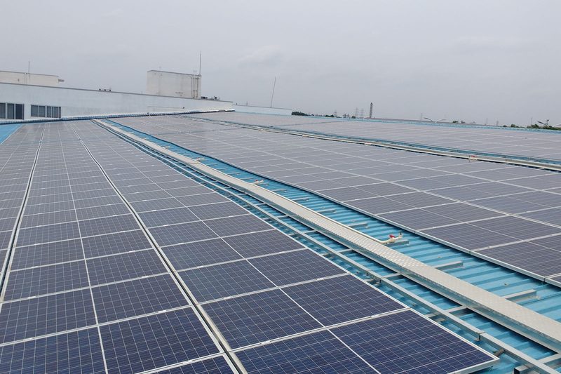 Rooftop solar on the GI-sheet roof of a textile processing unit